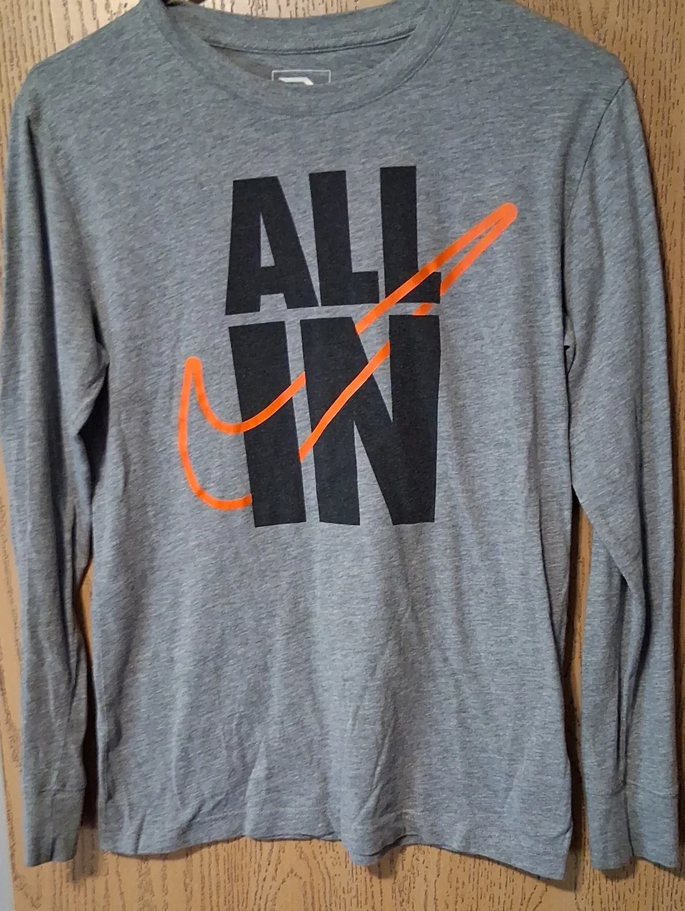 Nike Grey Long Sleeve Tee with Orange Swoosh 'ALL IN' Graphic